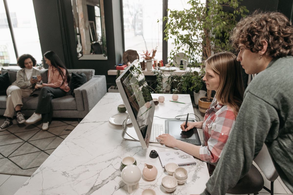 Two people working together at home